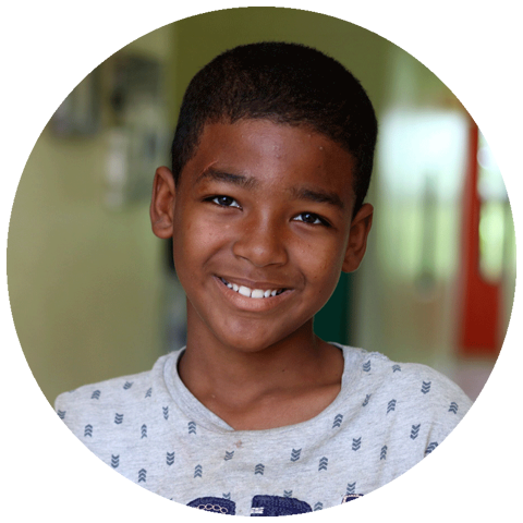 early childhood aged boy smiling at camera