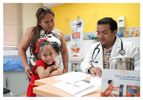 a little girl and her mom in a doctor appointment