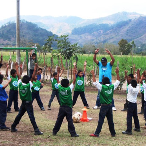 a group of young men playing a game of soccer