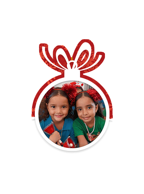 two girls smiling at the camera