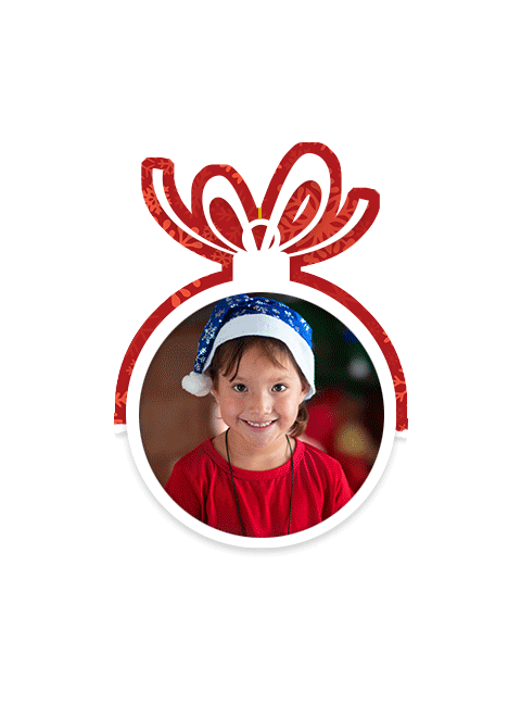 a boy smiling to the camera