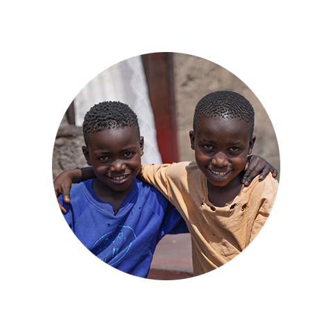 2 kids in Zambia smile for the camera