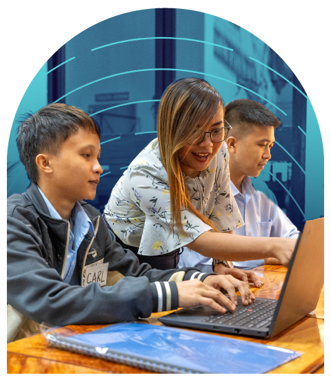 young adults in front of a computer